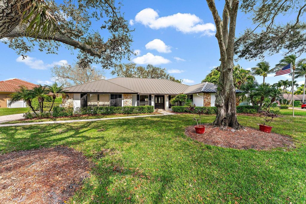 Photo of 59 SE Turtle Creek Drive, Tequesta, FL 33469 (MLS # R11062059)