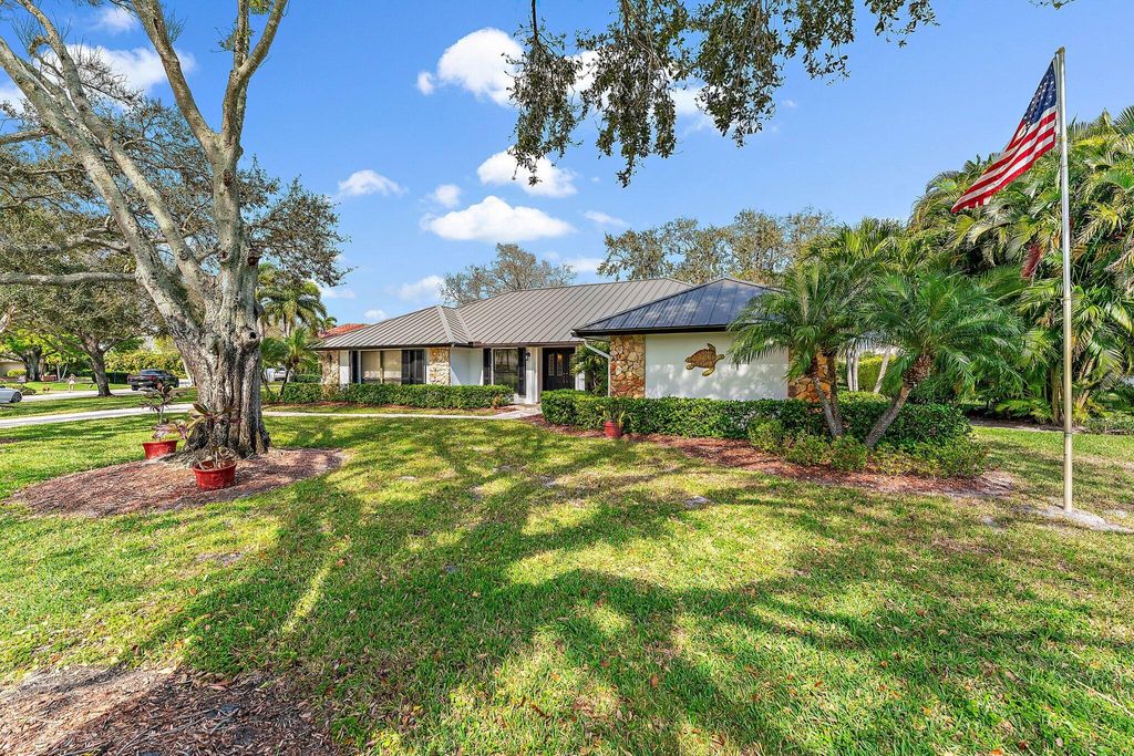 Photo of 59 SE Turtle Creek Drive, Tequesta, FL 33469 (MLS # R11062059)
