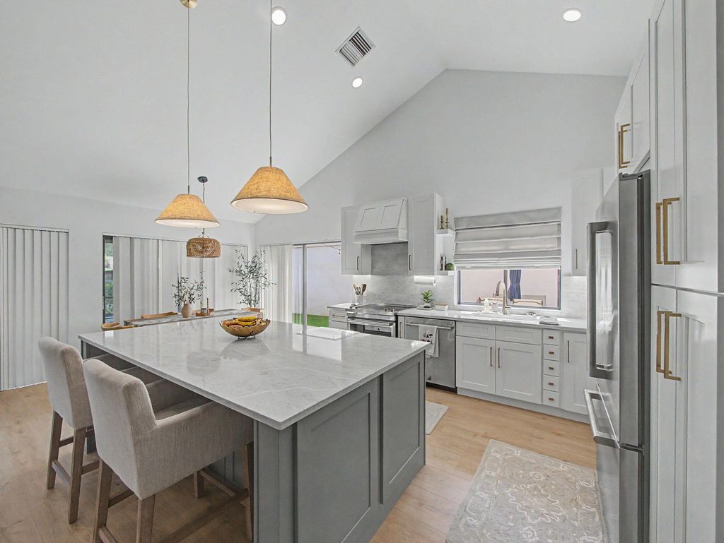 Photo of 2631 Mohawk Circle, West Palm Beach, FL 33409 (MLS # B26028325)