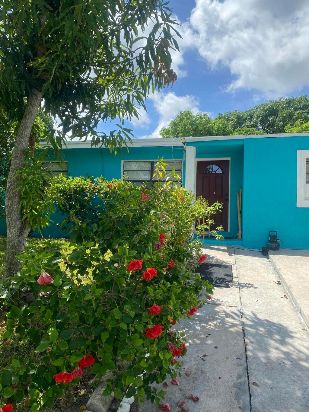 Photo of 200 Ficus Tree Drive, Lake Worth, FL 33462 (MLS # R11120162)