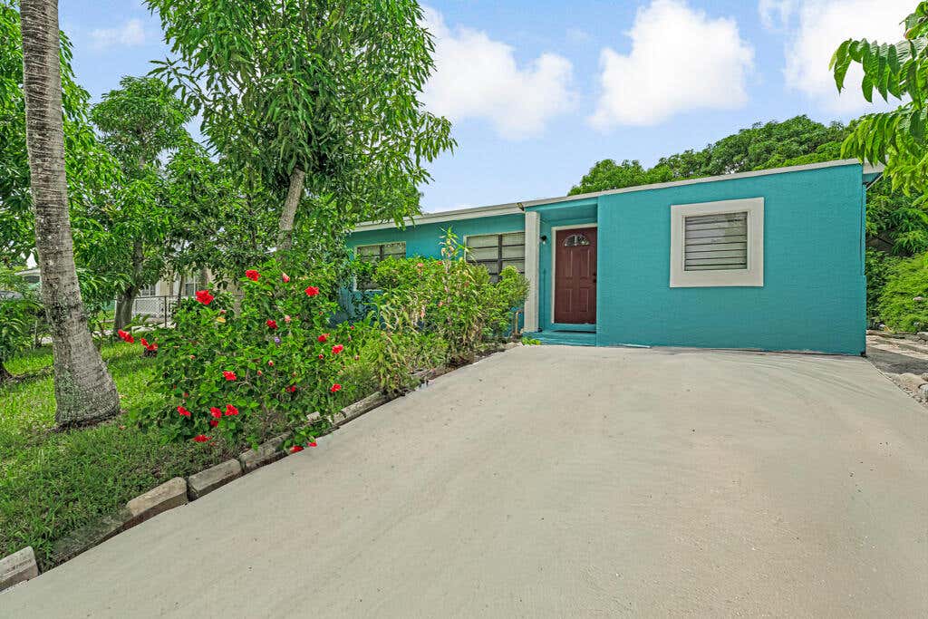 Photo of 200 Ficus Tree Drive, Lake Worth, FL 33462 (MLS # R11120162)