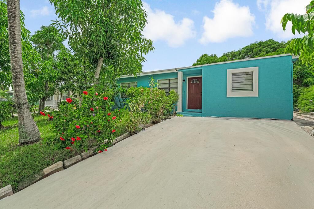 Photo of 200 Ficus Tree Drive, Lake Worth, FL 33462 (MLS # R11120162)