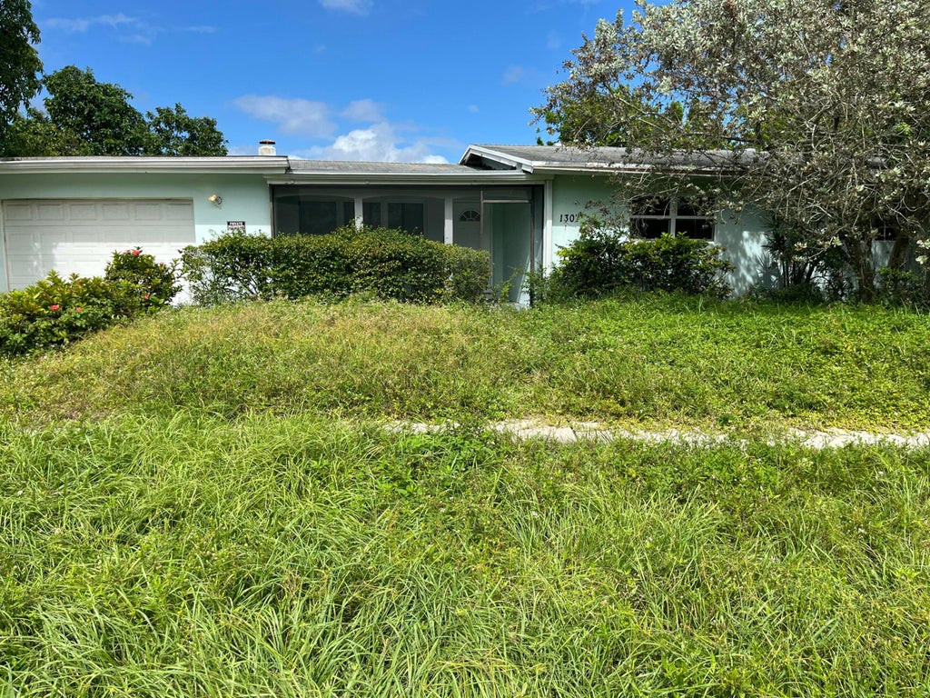 Photo of 1307 NW 15TH Place, Fort Lauderdale, FL 33311 (MLS # B26094442)