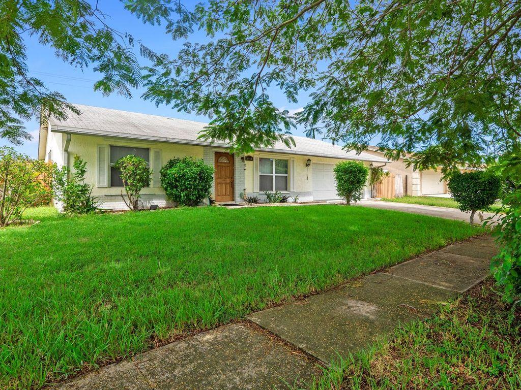BEAUTIFUL VERY WELL KEPT HOME L ON A BEAUTIFUL BIG LOT. HOME IS LOCATED ON A NICE AND QUIET STREET. HOUSE BOAST A BIG KITCHEN WITH GRANITE COUNTER TOP, UPDATED CABINETS. TILE AND WOODEN FLOOR, MASTER BEDROOM WITH MARBLE FLOOR AND BUILT IN CLOSET, HURRICANE SHUTTERS AND FENCED BACK YARD.COVERED PATIO IN THE BACK FOR RELAXING. 10 MINUTES TO THE BEACH. CLOSE TO SHOPS, RESTAURANTS, AEROPORT AND MORE. GREAT LOCATION WOULDN'T LAST COME FAST!!