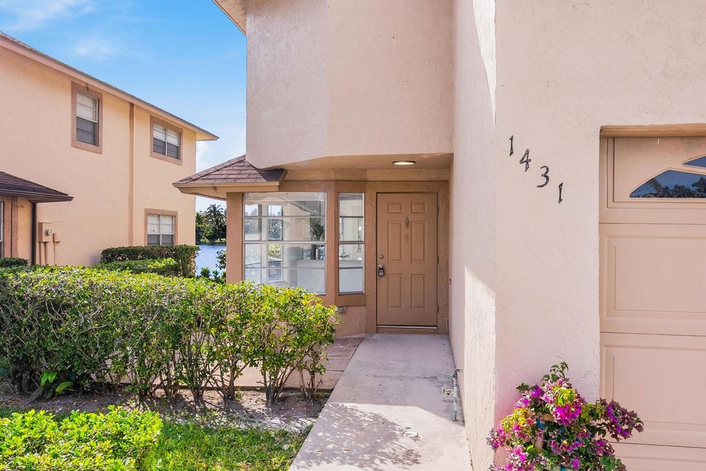 Photo of 1431 S Lake Mango Way, West Palm Beach, FL 33406 (MLS # R10962425)