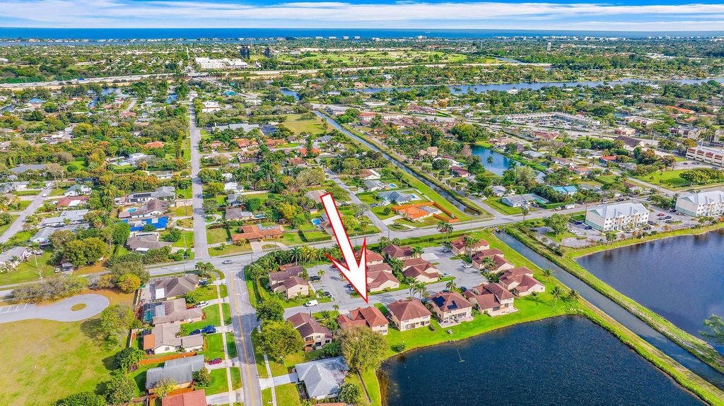 Photo of 1431 S Lake Mango Way, West Palm Beach, FL 33406 (MLS # R10962425)