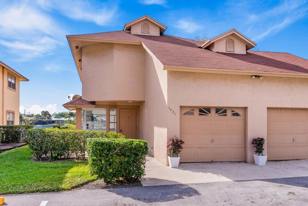 Photo of 1431 S Lake Mango Way, West Palm Beach, FL 33406 (MLS # R10962425)