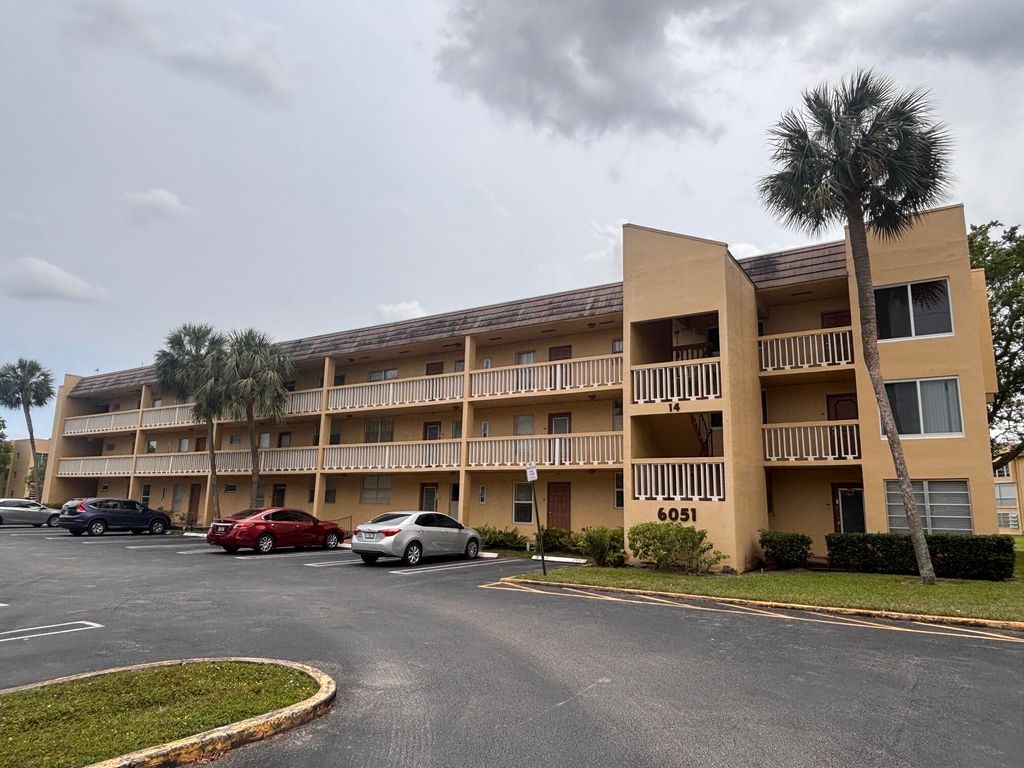 Photo of 6051 NW 61st Avenue #103, Tamarac, FL 33319 (MLS # B26027600)