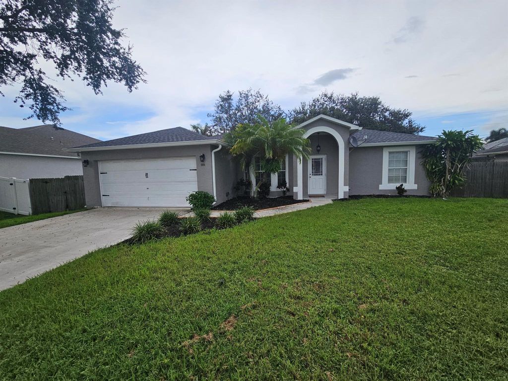 Photo of 4243 SW Utterback Street, Port Saint Lucie, FL 34953 (MLS # R11018136)