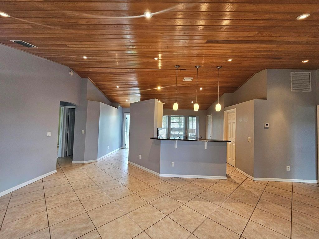 Photo of 4243 SW Utterback Street, Port Saint Lucie, FL 34953 (MLS # R11018136)