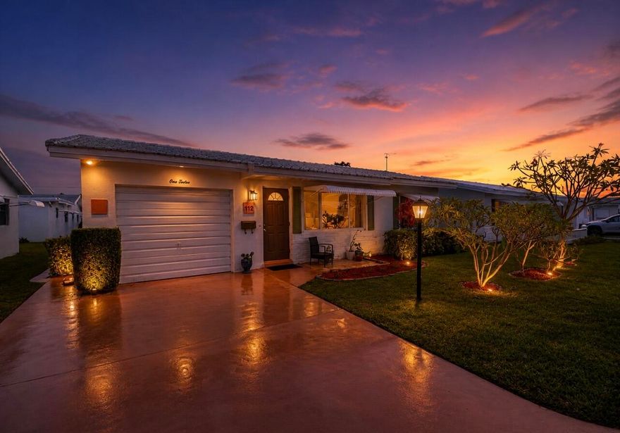 HURRY! Cozy and Bright, where the Comfort and Practical meets! All the heavy lifting has been done here. ROOF 2017, FULL HURRICANE IMPACT WINDOWS & DOORS. SELLER IS OFFERING $7,000 TOWARD THE BUYER'S CLOSING COSTS OR A RATE BUY-DOWN. An added rare advantage is the paid-off REC lease ($25K value), which covers your 18-hole golf. Newer appliances including fridge (6 months), washer (2018), dryer (2024), and dishwasher (3 yrs). The NEW KITCHEN with large island and top-of-the-line granite countertops flows into a spacious layout and bright Florida/sunroom, can be 3rd room—perfect for extra living space or home office. Low HOA of $184 covers exterior maintenance, lawn care, pest control, pressure cleaning the roof, painting, and more. Only $25/month  for cable & 500 Mbps internet. Private backyard and 1-car garage for added storage.  Located in desirable Palm Beach Leisureville, enjoy a vibrant 55+ lifestyle with 3 heated pools, clubhouses, fitness center, hot tub. Prime Boynton Beach location near beautiful Delray Downtown, sandy beaches, minutes to shopping, dining, medical centers, I-95, and PBI Airport—move-in ready.
