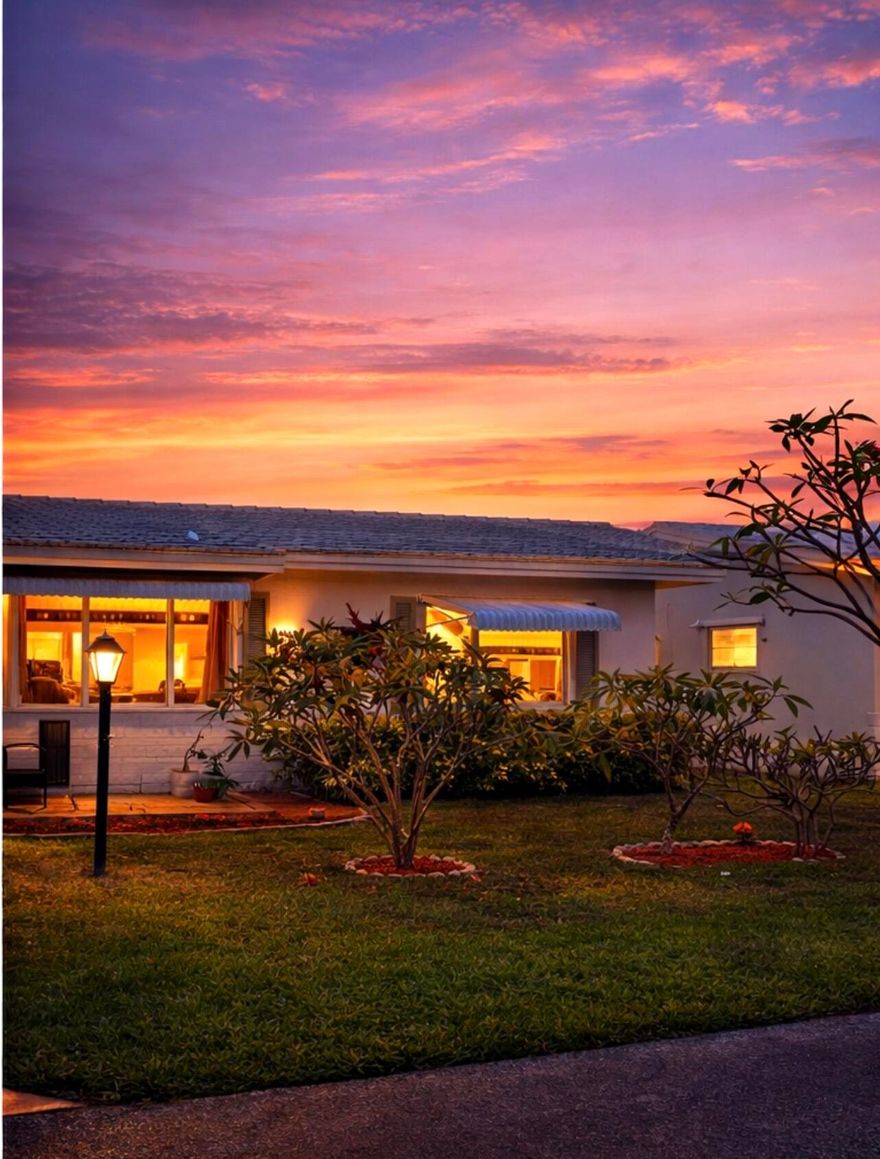 HURRY! All the heavy lifting has been done here. Roof, full impact windows, paid REC Lease ($25K value), and newer appliances including fridge (6 months), washer (2018), dryer (2024), and dishwasher (3 yrs). The beautifully upgraded kitchen with large island and top-of-the-line granite countertops flows into a spacious layout and bright Florida/sunroom—perfect for extra living space or home office. Low HOA of $184 covers exterior maintenance, lawn care, pest control, pressure washing, painting, and more. Only $25/month for cable & 500 Mbps internet. Private backyard and 1-car garage for added storage.  Located in desirable Palm Beach Leisureville, enjoy a vibrant 55+ lifestyle with 3 heated pools, clubhouses, fitness center, hot tub, and FREE 18-hole golf. Prime  Boynton Beach location near beautiful Delray Downtown, sandy Atlantic beaches, minutes to shopping, dining, medical centers, I-95, and PBI Airport—move-in ready. This home won't last!