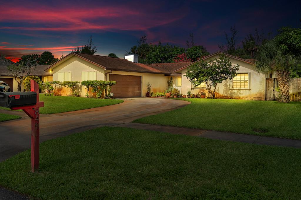 CBS 3 bedroom 2 bath in a sleepy little neighborhood close to everything. Fenced rear yard huge 4 car driveway plus a side entry 2 car garage. Large covered and screened in patio off the family room not updated but very well cared for on the interior. Seller prefers pre-approval from Ryan D. Brown at Cross Country Mortgage LLC, but is not required.