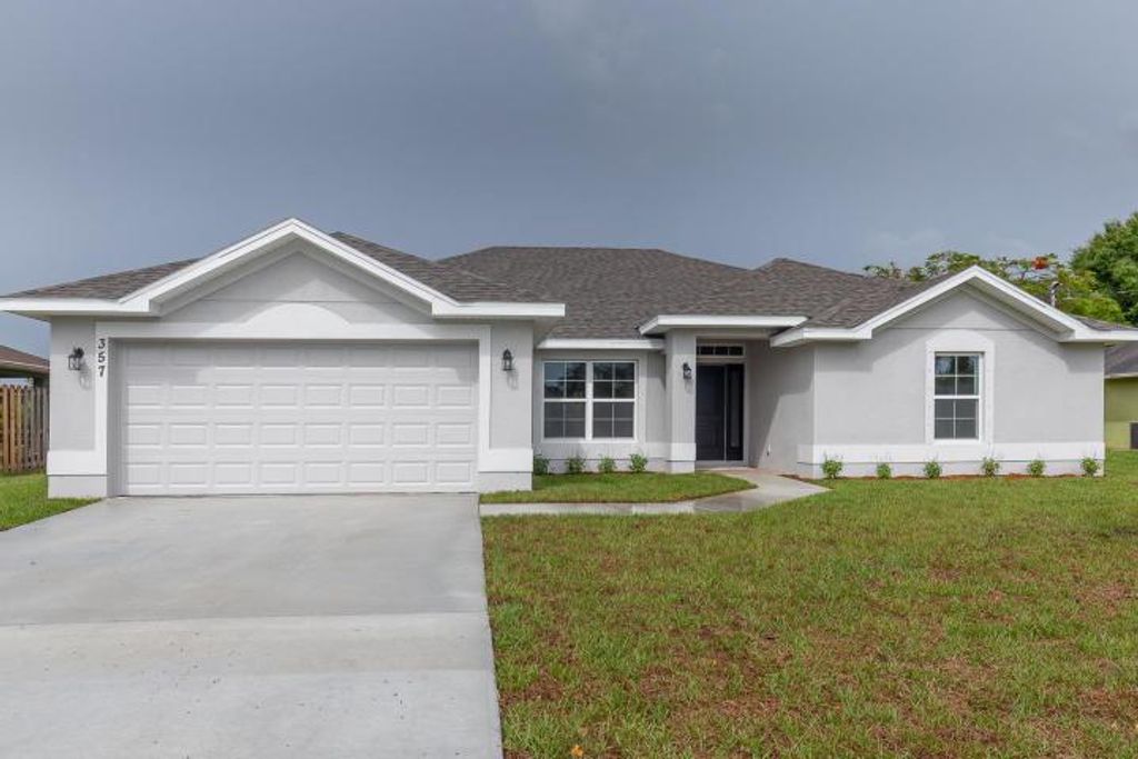 Photo of 5890 NW Hann Drive, Port St Lucie, FL 34986 (MLS # R10815276)