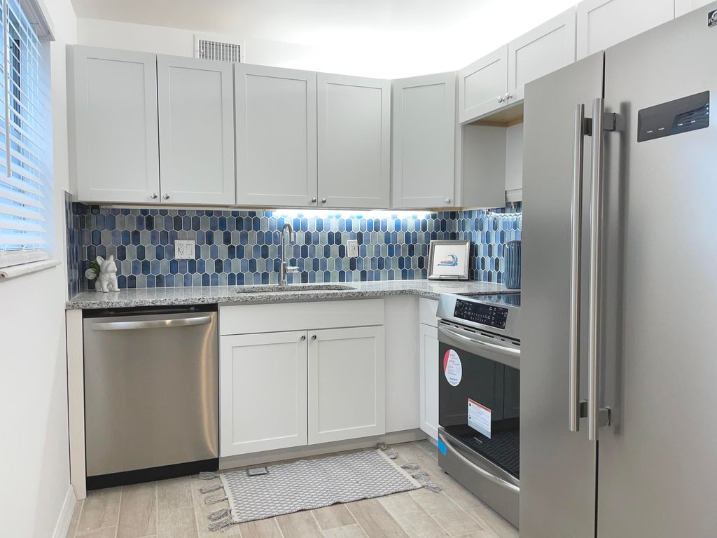 Photo of 2600 SE Ocean Boulevard Blvd #B7, Stuart, FL 34996 (MLS # R10810249)