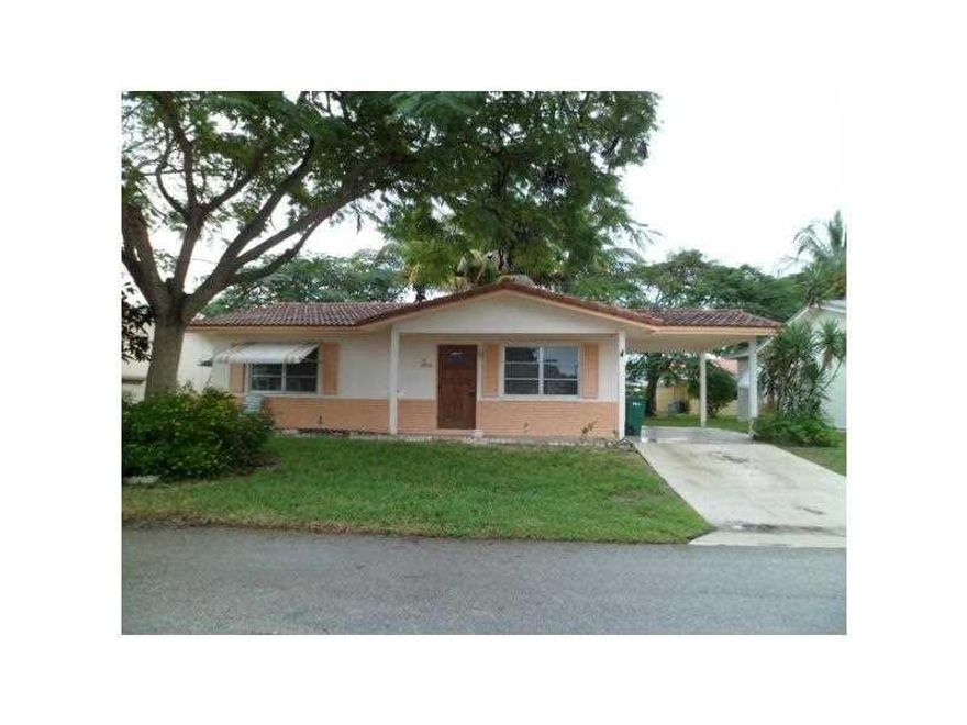 Charming 2 Bedroom,1 1/2 Bathroom light and bright with large neutral tile throughout, freshly painted with Large living room open to kitchen. Enclosed florida room for added living space and has a nice sized screened in Patio. Large walk-in closet in Mas ter and guest Bedroom. Barreled tile Roof. Short walk to the Beautiful new city park. Very quiet 55+ Neighborhood close to major highways and shopping.