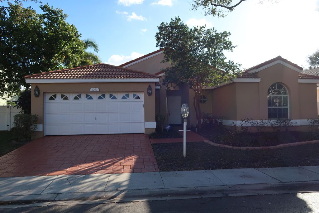 Photo of 1073 Siena Oaks Circle, Palm Beach Gardens, FL 33410 (MLS # R10768896)