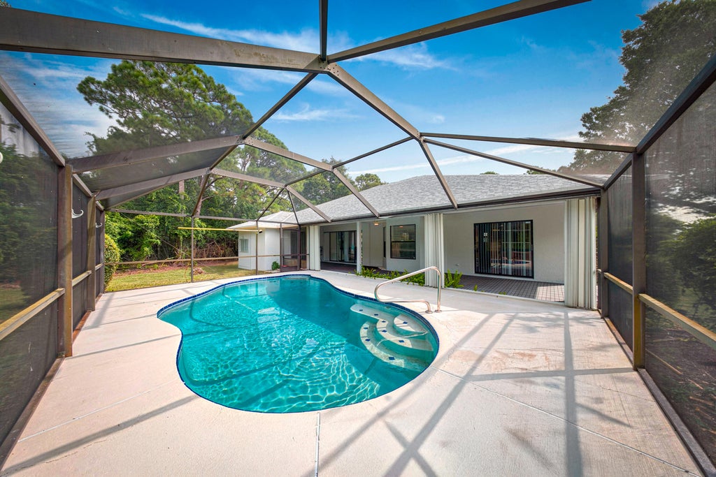Photo of 1792 SW COCHRAN Street, Port Saint Lucie, FL 34953 (MLS # B26072240)