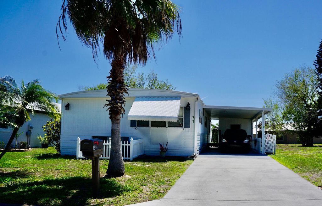 Photo of 31 Mediterranean Boulevard N, Port Saint Lucie, FL 34952 (MLS # B26008036)