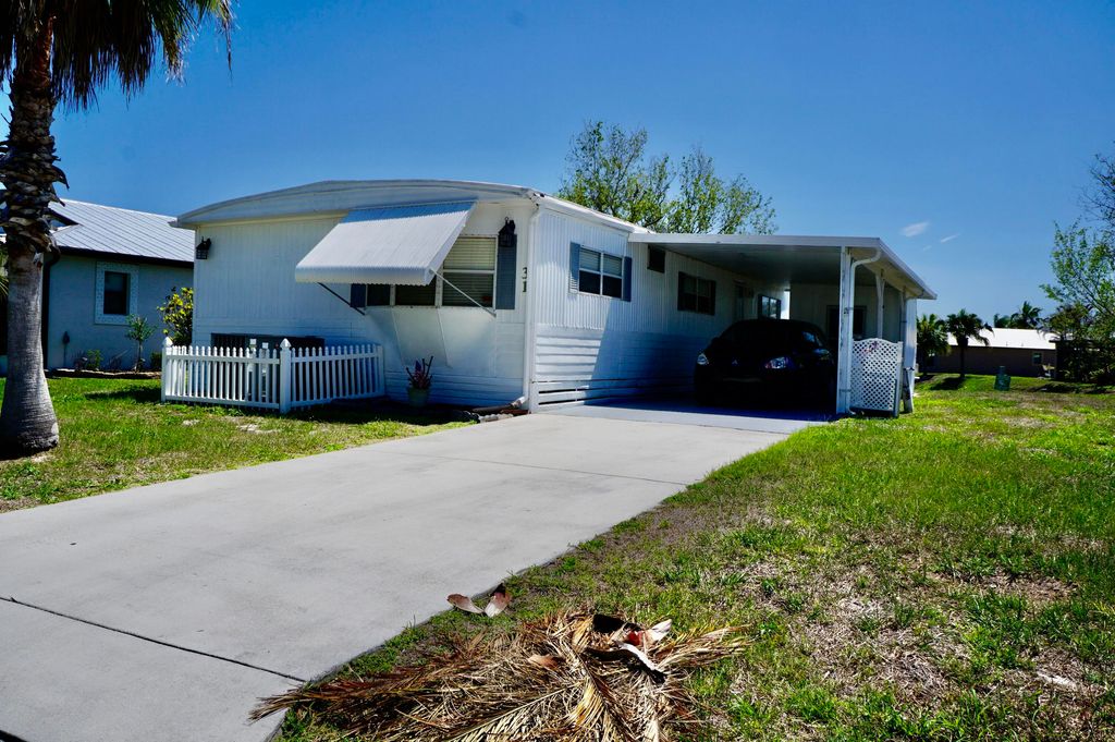 Photo of 31 Mediterranean Boulevard N, Port Saint Lucie, FL 34952 (MLS # B26008036)