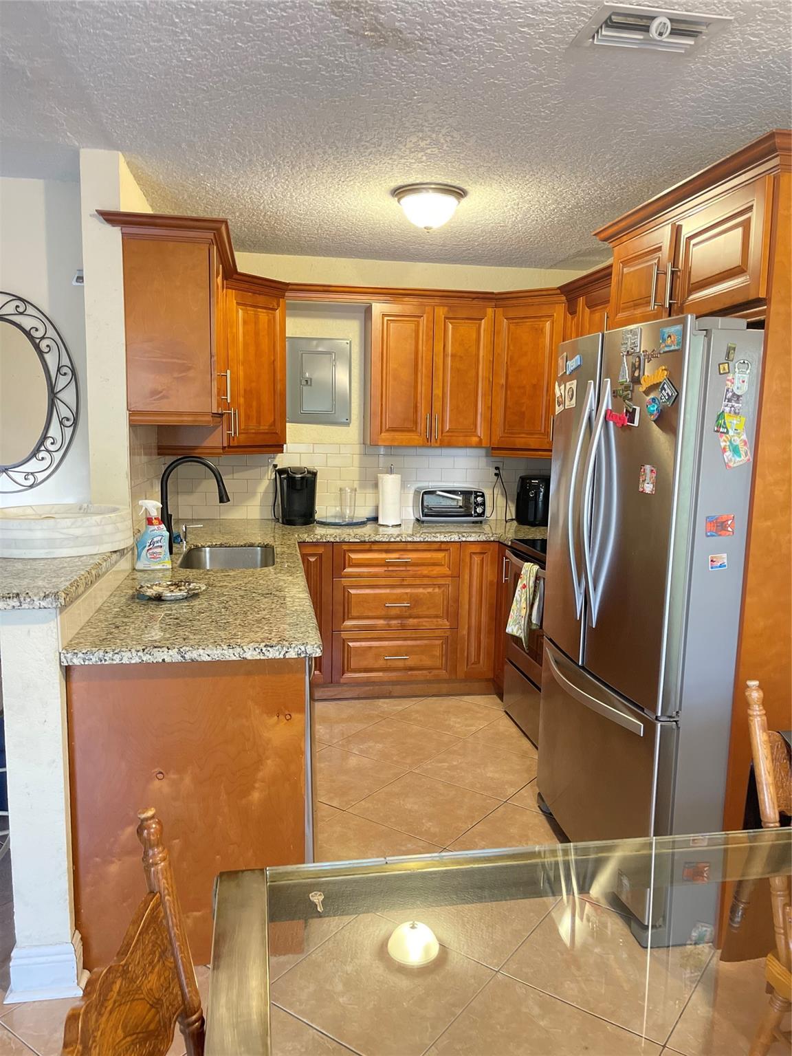 NICE CORNER LOT VILLA 3 BEDROOM 2 BATH LOCATED IN DEERFIELD BEACH, NOT FAR FROM THE BEACH, QUIET COMMUNITY, YARD HAS LOTS OF FRUIT TREES, AMPLE BACKYARD SPACE FOR ENTERTAINING, OUTDOOR KITCHEN AND BARBECUE SPACE, NICE GRANITE COUNTER TOPS, OPEN FLOOR PLAN TO LIVING ROOM AND DINING ROOM, ALL AGE COMMUNITY, PET FRIENDLY COMMUNITY. SELLER IS MOTIVATED, COME WITH YOUR HIGHEST AND BEST OFFERS.