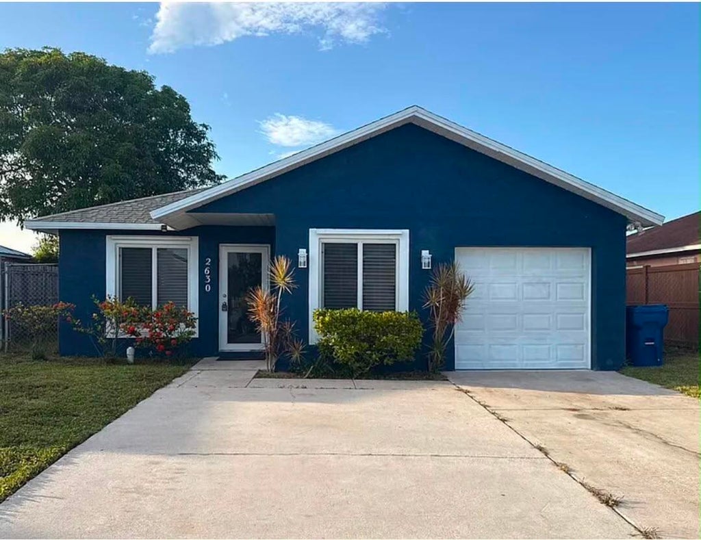 Photo of 2630 W 28th Street, West Palm Beach, FL 33404 (MLS # B26056550)