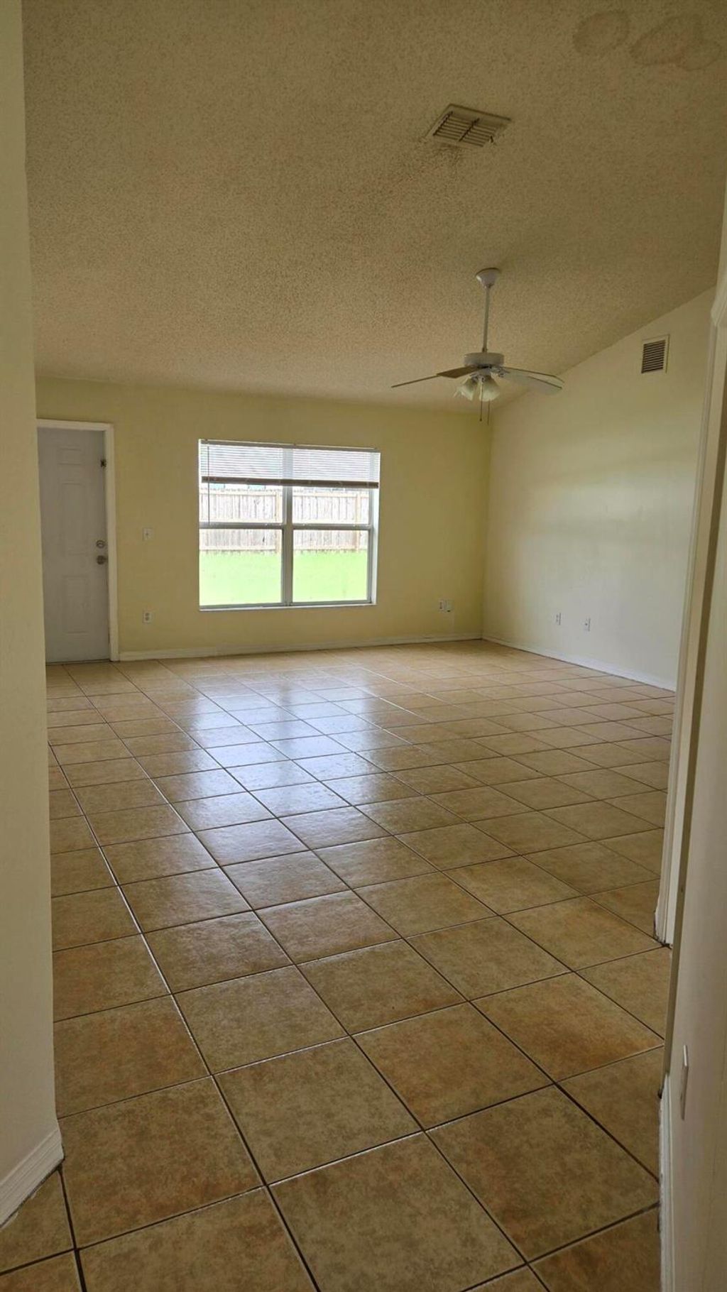 Photo of 737 SW Jordin Avenue, Port Saint Lucie, FL 34953 (MLS # R11130328)