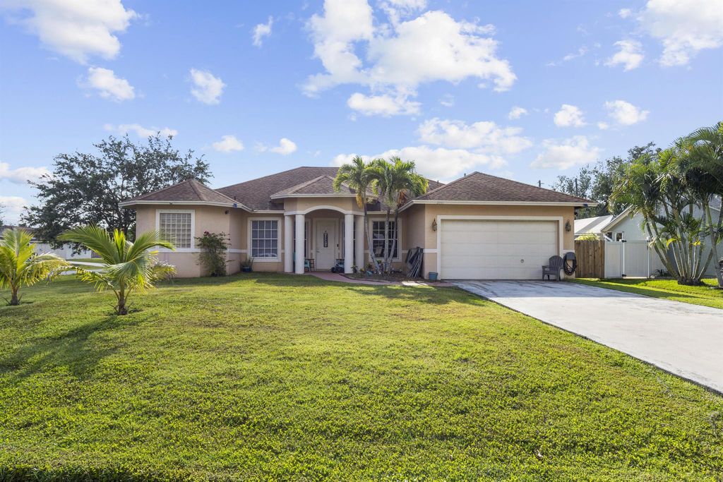 Photo of 2001 SE Parrot Street, Port Saint Lucie, FL 34952 (MLS # R11089083)