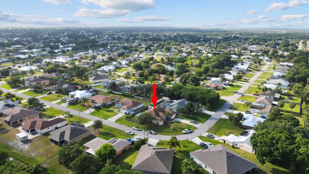 Photo of 2001 SE Parrot Street, Port Saint Lucie, FL 34952 (MLS # R11089083)