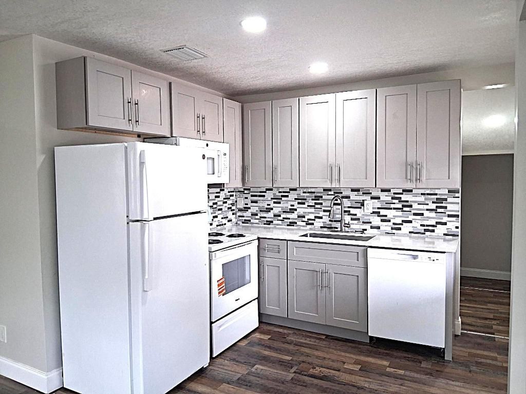 Photo of 1216 Pioneer Road #(House), Mangonia Park, FL 33407 (MLS # R11156551)