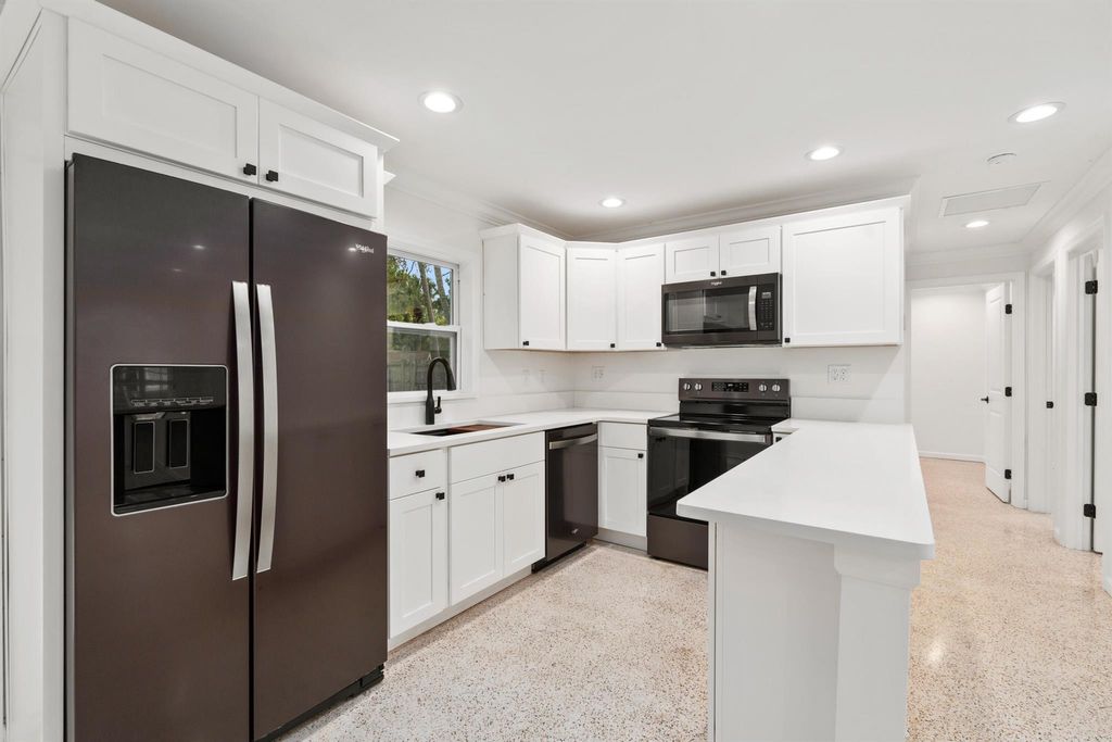 Photo of 5788 SE Wesley Ave, Stuart, FL 34997 (MLS # R11098237)