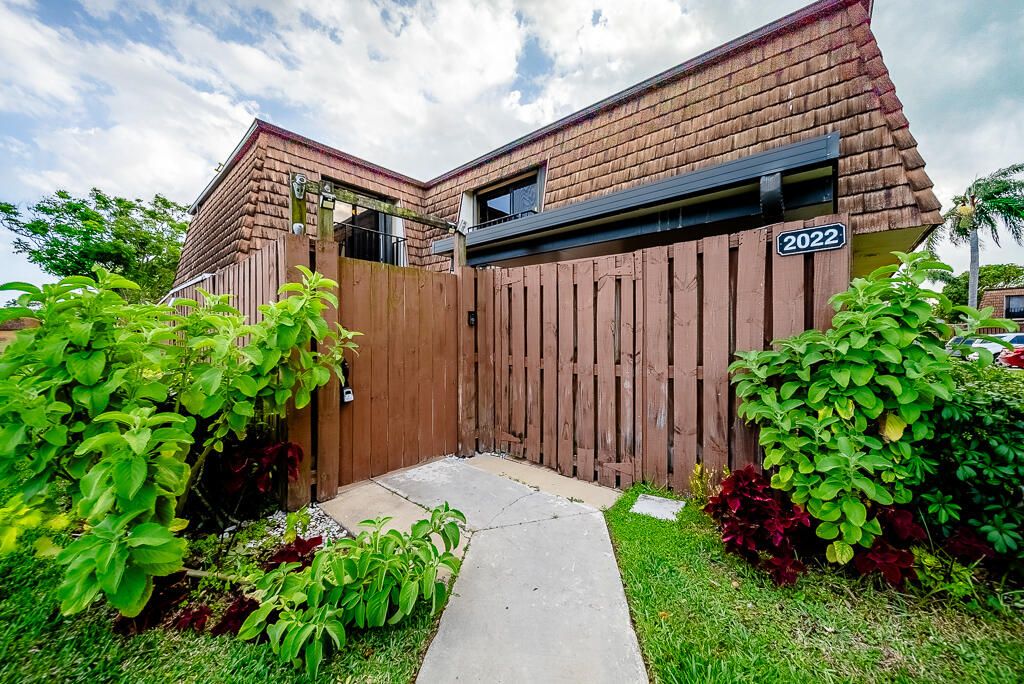 Photo of 2022 20th Lane, Greenacres, FL 33463 (MLS # R11081060)