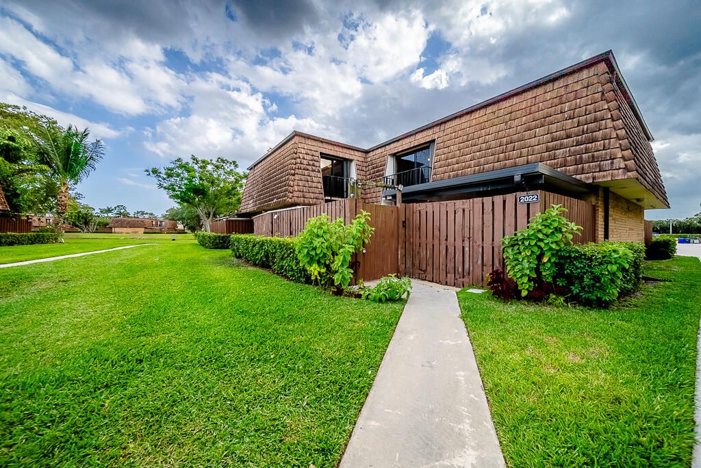 Photo of 2022 20th Lane, Greenacres, FL 33463 (MLS # R11081060)