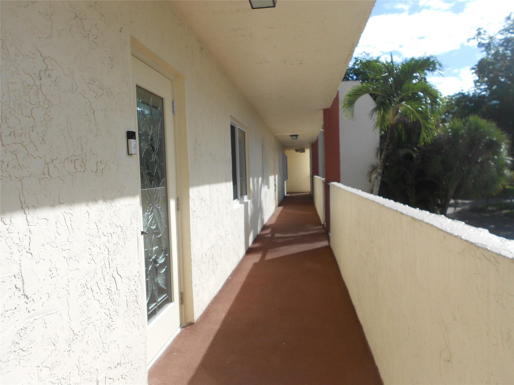 Snow Birds welcome. Large enough for 2 couples and share the expenses. Spacious, well-maintained 2 bedrooms/2 baths in excellent condition with over 1450 sq. ft. Open floor plan, large kitchen with lots of storage, impact windows and doors, large screened patio leading from both Master Bedroom and Living Room, luxury vinyl floor throughout, washer and dryer in Unit. Great opportunity to spend some time in the beautiful Hollybrook Golf and Tennis Club, a premier 55+ gated community, 24 hour security, dine at the "Restaurant at Hollybrook". Many amenities including PGA Championship course, an 18 hole executive golf course, tennis and pickle ball courts, 7 swimming pools, BBQ and picnic areas, social hall, library, fitness center, car wash area. So much to do or just relax the day away.