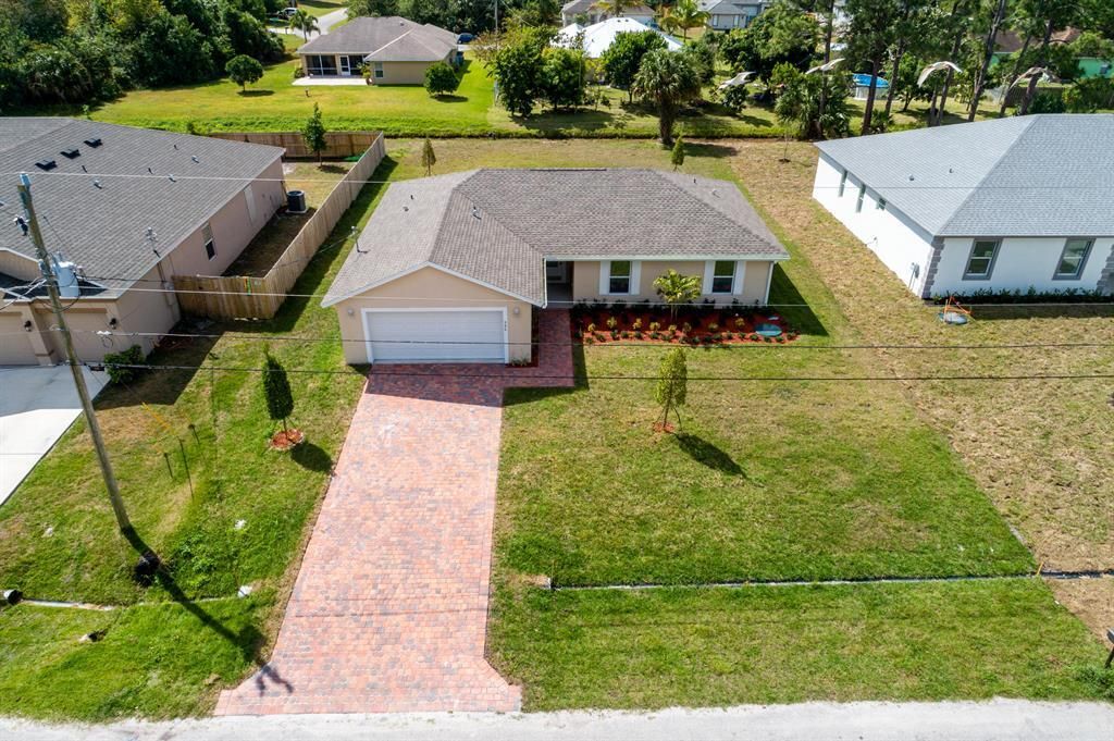 Photo of 986 SW Romaine Lane, Port Saint Lucie, FL 34953 (MLS # B26012582)