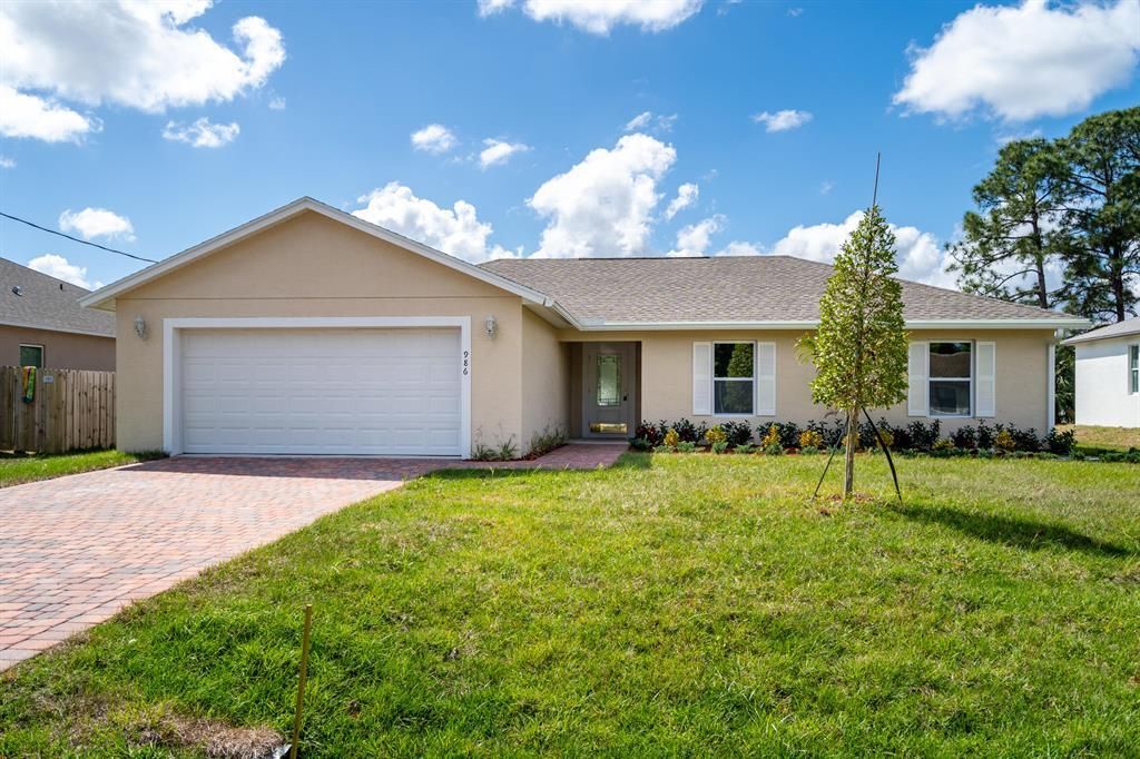 Photo of 986 SW Romaine Lane, Port Saint Lucie, FL 34953 (MLS # B26012582)