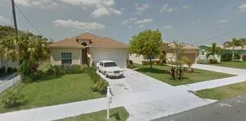 Photo of 413 NW 9th Ave Ave, Pompano Beach, FL 33060 (MLS # F10312771)