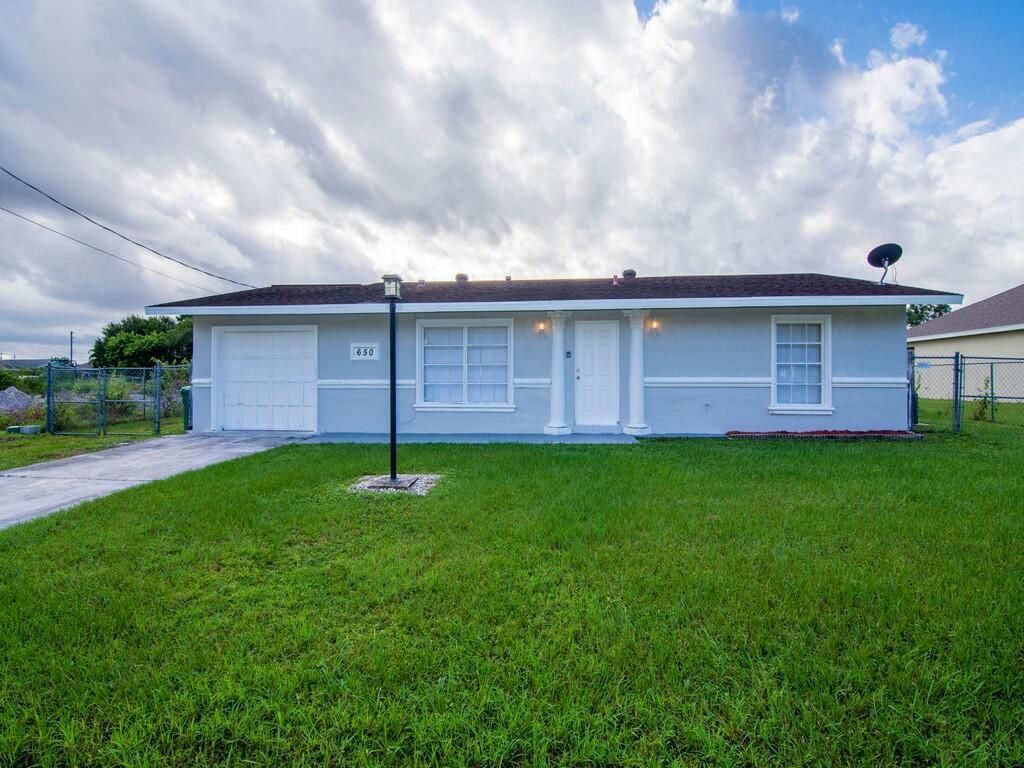 Photo of 650 SE Evergreen Terrace, Port Saint Lucie, FL 34953 (MLS # R11060980)