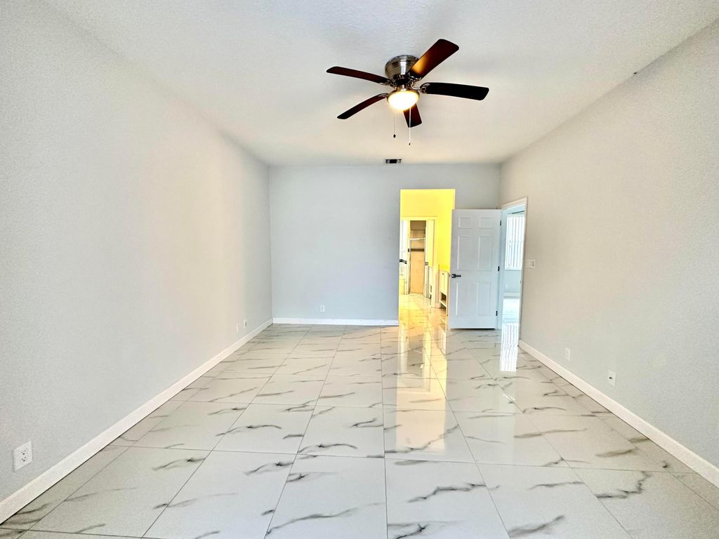 Photo of 1219 Baycourt Isle, Greenacres, FL 33413 (MLS # R11160258)