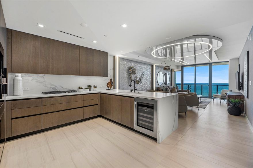 True epitome of beach front living w/ breathtaking views. Interior designed & decorated by world famous interior designer Perla Lichi. This exclusive one of kind ocean front gem is ready to move in. Flow through unit featuring Ocean & City Views. Semi Private Elevator to Private Foyer Entrance, 3 bed, 3.5 baths + Den, Beautiful flooring throughout, Gourmet kitchen w/ Gas Cook Top. SOLEMAR provides the most Equisite & Expansive ocean views of Pompano's White Sandy Beaches. Live like you're on vacation while enjoying 5 Star Hotel Concierge Services & Resort style amenities. State of the Art Fitness center w/ sauna, steam room & treatment room. 2 pools & Club room, Bar, pool table & TV, Cappuccino Machine, Wine tasting room w/ private Wine Cellars, Social room w/ Ocean & Pool View.