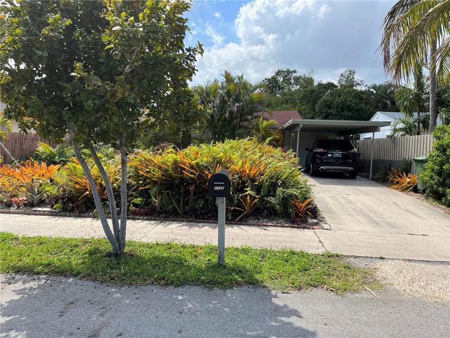 This charming 2/1 home boast a lot of character with its colorful rooms. Walk into a tropical oasis that bring a Zen feeling to the house. Attached carport with access to  the laundry. Pet friendly enclose extensive backyard with wooden fence.Great location, close to beaches, shops and restaurants. Near Wilton Manor and the new 13th St Arts District! Impact Windows, new split AC in each rooms, terrazzo floor. Open kitchen, living, dining room