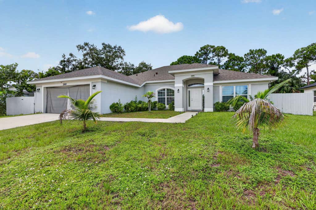 Photo of 3958 SW BRUNSWICK Street, Port Saint Lucie, FL 34953 (MLS # B26062110)