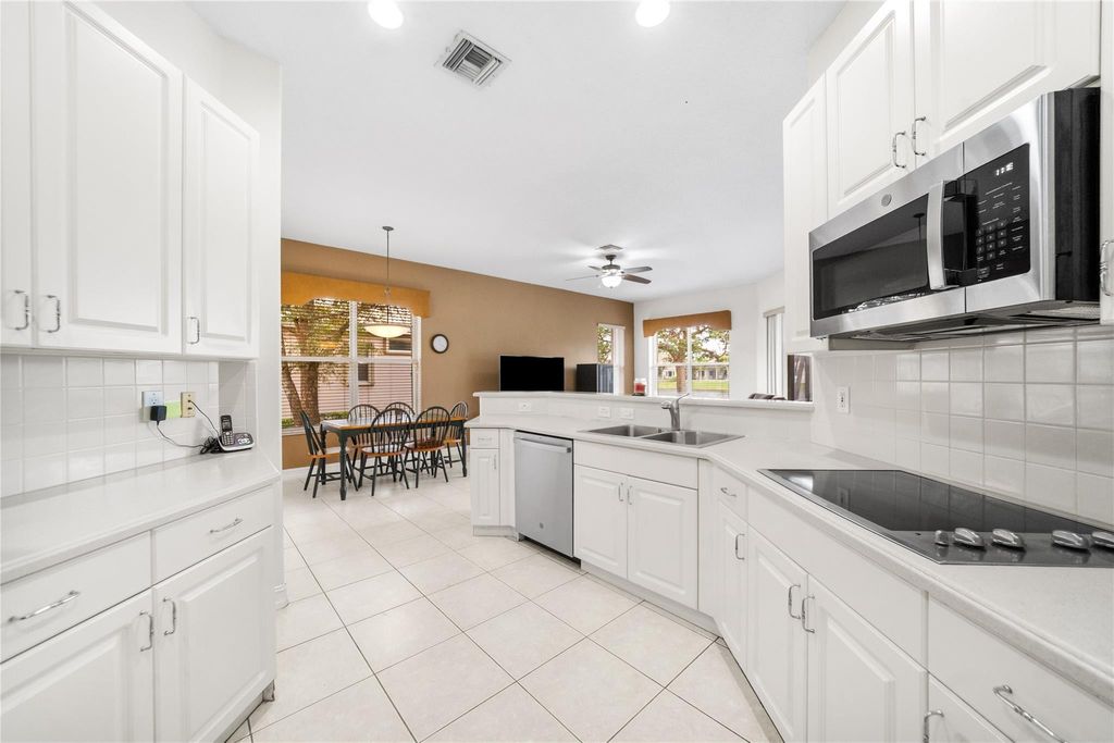 Photo of 11183 NW 69th Place, Parkland, FL 33076 (MLS # F10549165)