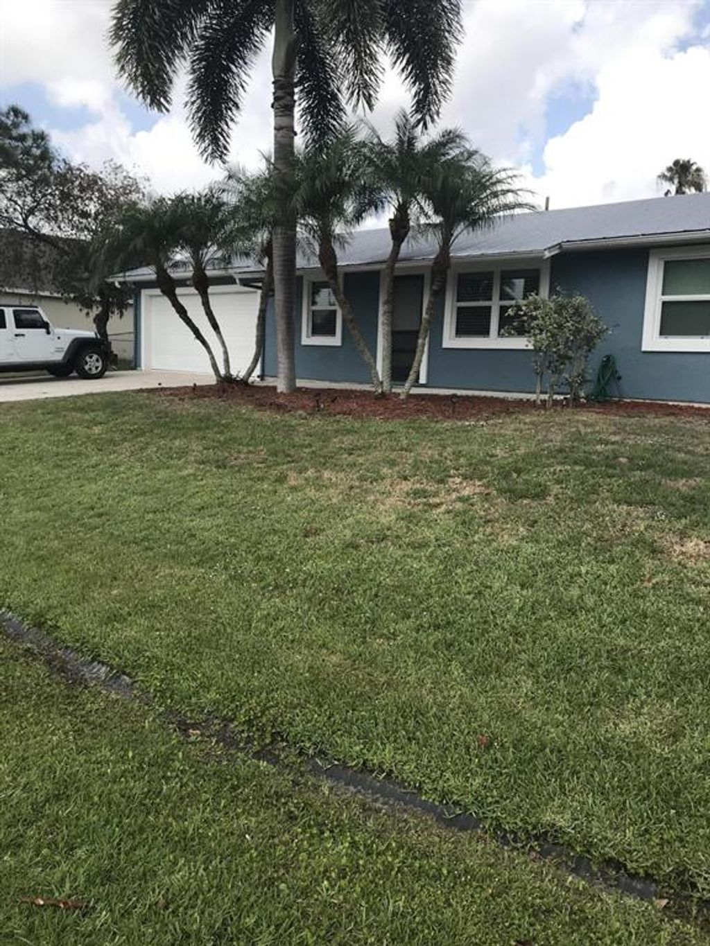 Photo of 901 SW Fenway Road, Port Saint Lucie, FL 34953 (MLS # R10789869)