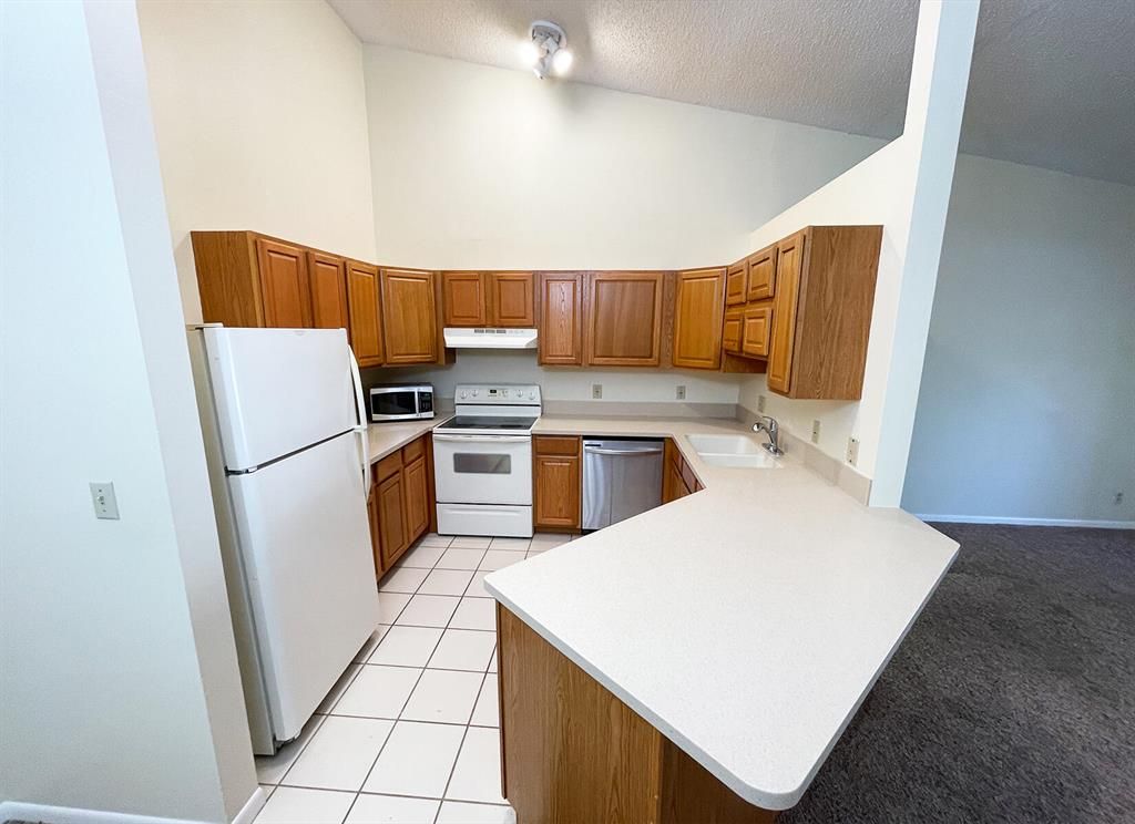 Photo of 6555 Chasewood Drive #F, Jupiter, FL 33458 (MLS # R10868079)