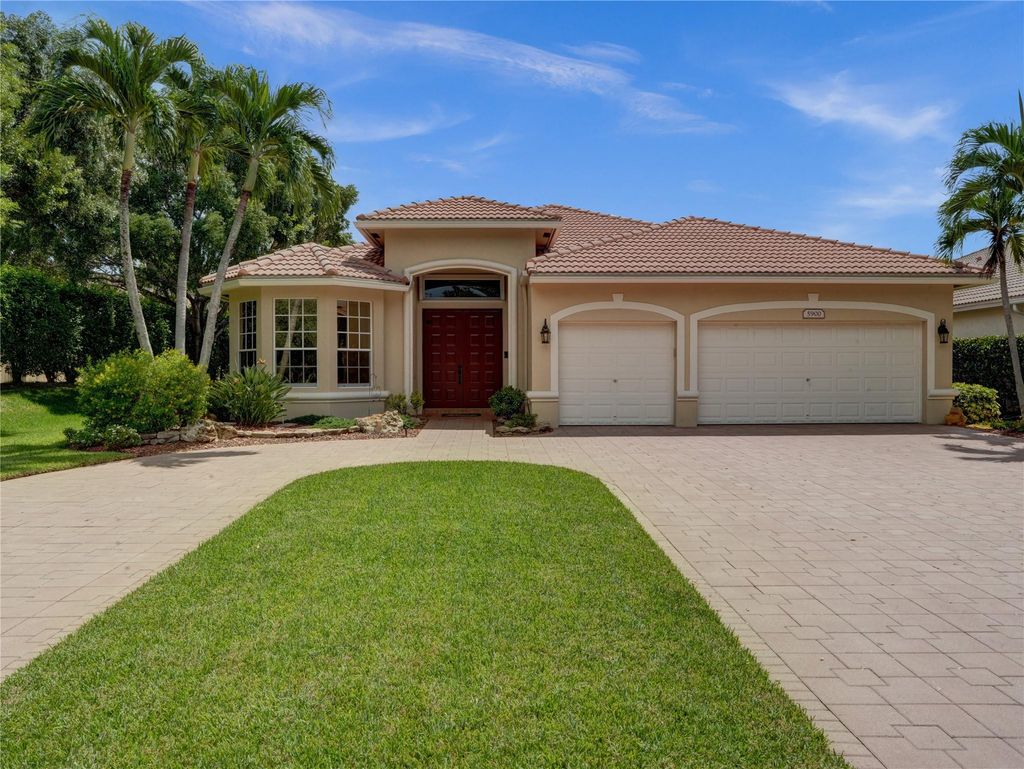 Photo of 5900 NW 56th Circle, Coral Springs, FL 33067 (MLS # F10457597)