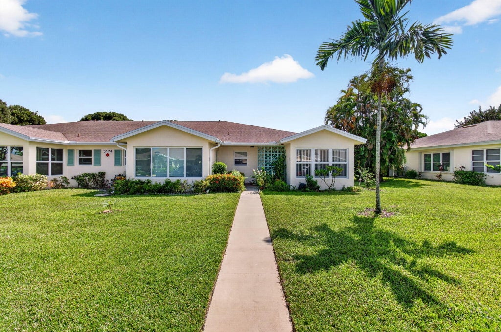 Photo of 5174 LAKEFRONT Boulevard #D, Delray Beach, FL 33484 (MLS # B26072850)