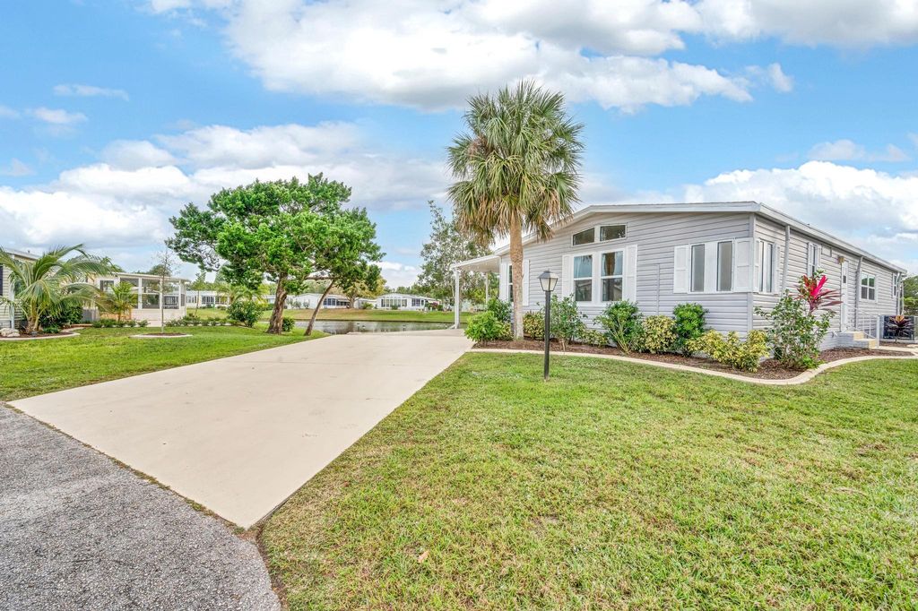 Photo of 3143 Crabwood Lane, Port Saint Lucie, FL 34952 (MLS # R10942929)