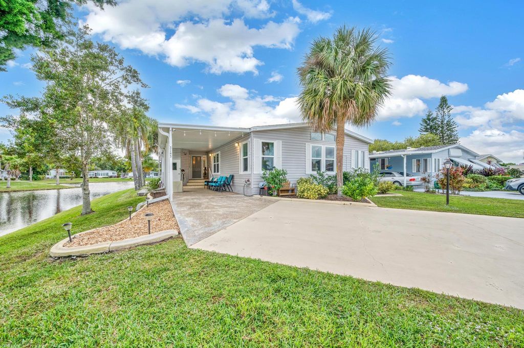 Photo of 3143 Crabwood Lane, Port Saint Lucie, FL 34952 (MLS # R10942929)