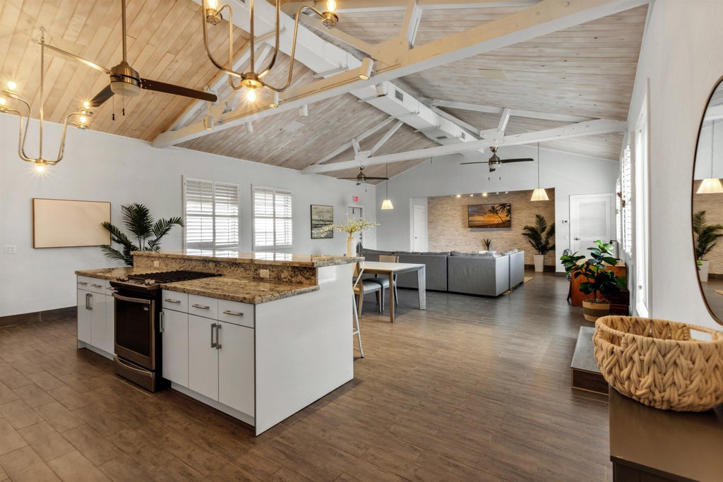 Photo of 419 E Atlantic Avenue, Delray Beach, FL 33483 (MLS # B26091939)